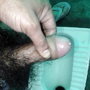 Indian middle age man massage his pennis with oil and gel