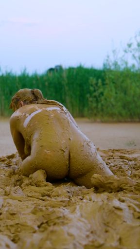 Captivating moment from &quot;Orgasm in lake of mud - masturbating in clay&quot;