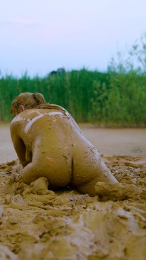 Captivating moment from &quot;Orgasm in lake of mud - masturbating in clay&quot;