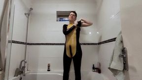 behind the scenes: getting out of my latex catsuit after a long day of filming. i do love the way my skin looks when it s all...
