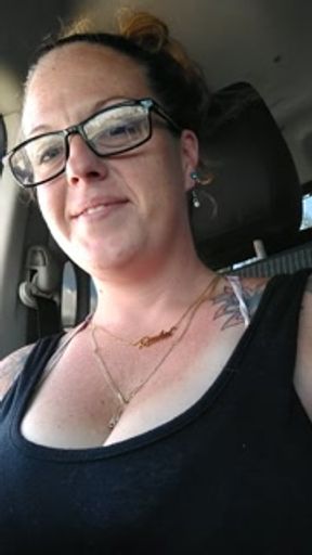 I film myself smoking cigarette while in passenger seat of truck cruising