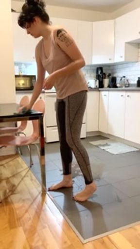 Casually wetting in the kitchen