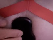 Ass being stuffed with a buttplug