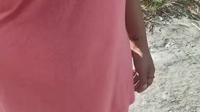 Brown-skinned cutie shows off big cock at nude beach
