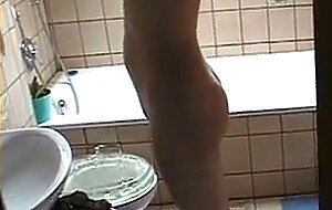 Wife gives blowjob at bathroom
