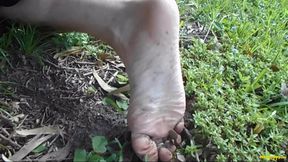 Creeping on Dirty Bare Feet Outdoors