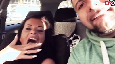 Busty MILF agrees to fuck a stranger in the car for some cash