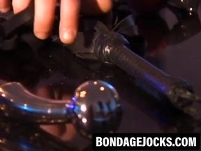 Hunky Robert Black suffers pleasure and pain on sub body