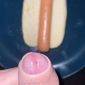 Huge watery cumshot on hotdog