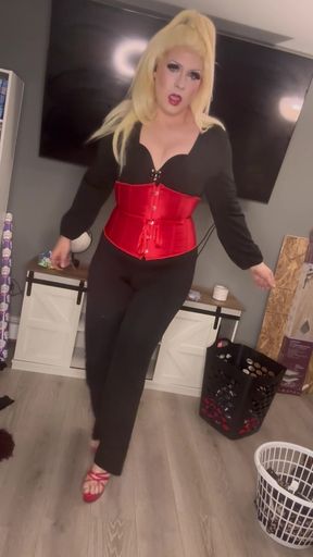 Blonde woman in corset and heels