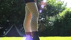 Naughty German goddess plays with a giant toy in the park