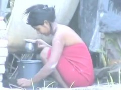 Indian Girl Washing Outdoors
