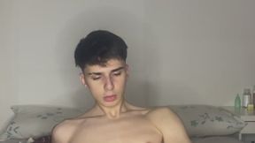 Laying down on my bed jerking off