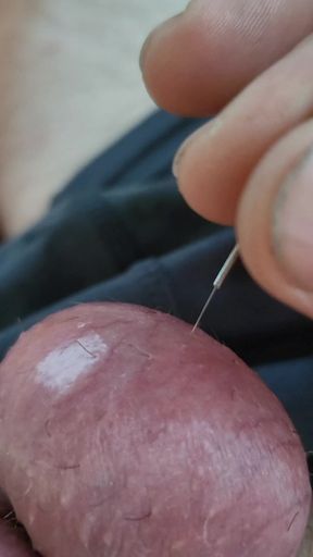 Ball fucking with a needle