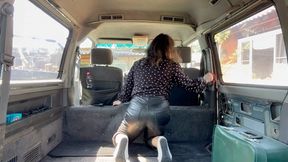 girl in leather pants cleaning her van aV