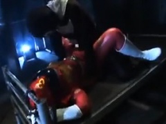 Nubile power ranger in a skintight orange suit takes a roug