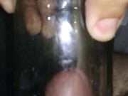 I penetrate my big cock in a glass bottle and I finish my milk in it