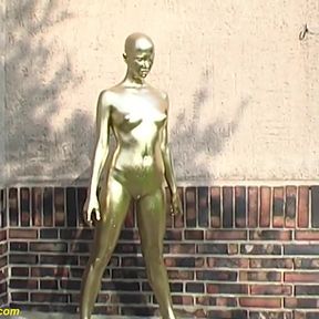 Real flexible contortionist gets golden painted