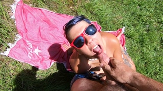 Outdoor blowjob with sunbathing girlfriend. Cum swallow.
