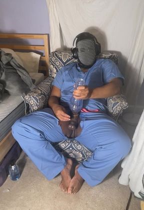 Man In Scrubs Jerking Out A Moaning Cumshot With Fleshlight