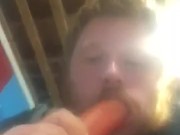 Fat guy sucking on dildo