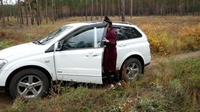 Pretty girl, driving the car and pedal pumping