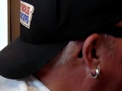 Horny DILF giving blowjob in gloryhole