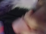 Horny slut in knee highs with a plug tail cums closeup