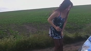 Sexy milf stranded on roadside shows off butt plug, rides glass bottle