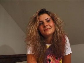 Gorgeous curly haired babe masturbating in solo video