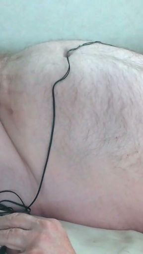 Hands free cumshot. Bound and stretched balls are swollen and shocked with estim along with nipples and cock   Clip 1