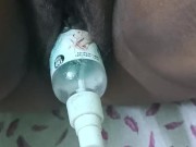 Putting sanitizer bottle in Neha's pussy