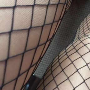 My legs on shiny glossy pantyhose and fishnet