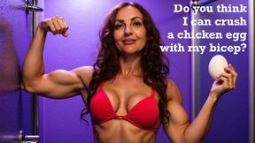 hard biceps trying to crush an egg