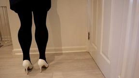 High Heel Shoe Tapping White Stilettos and Black Tights