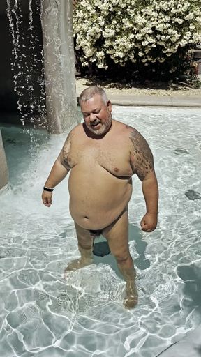 Fat old fat man pissing in the pool