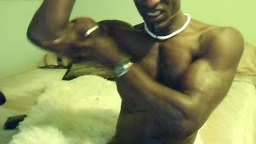 Flexed Muscles and Hard Cock