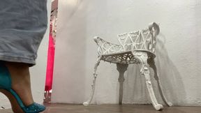 With pants and stiletto heels she keeps her legs crossed (5)