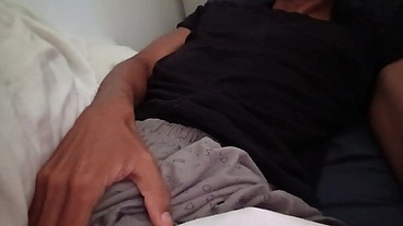 Morning Horny Guy Jerking off His Big Cock in Pajamas on the Bed After a Wild Party Night