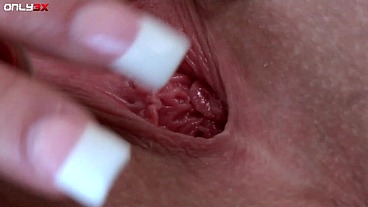 Playful blonde Phoenix Marie toying her dripping wet cunt