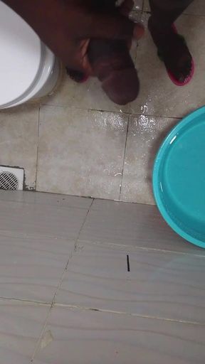Strocking my hard dick in the bathroom
