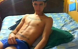 Latino twink strokes his dick
