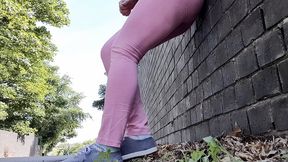 Pink leggings wetting peeing by the road