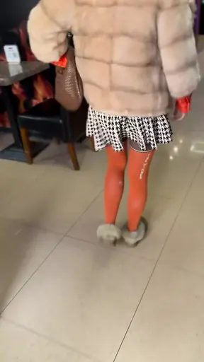 Naughty girl flashes her pussy at cafe patrons