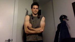 Fully Clothed Guy Flexes Biceps and Plays with Leather Belt