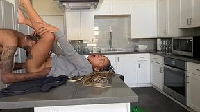 On the kitchen, the ebony gal in tats is getting something fierce in the kitchen