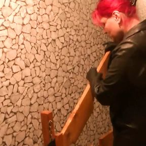 .Goddess Andreea excited her toilet in seethrough catsuit