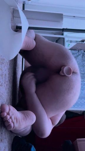 Chubby gay guy fills his ass with dildo