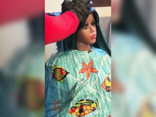 Older mini black sex doll cums after haircut