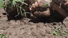 Goddess Samariel and Mistress Long Toenails foot fight in the mud